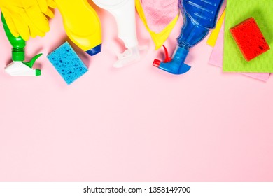 Cleaning Product, Household, Sanitary Supplies On Pink Background. Flat Lay Image With Copy Space.