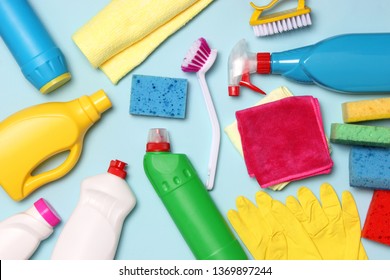 
Cleaning Products On A Colored Background Top View.