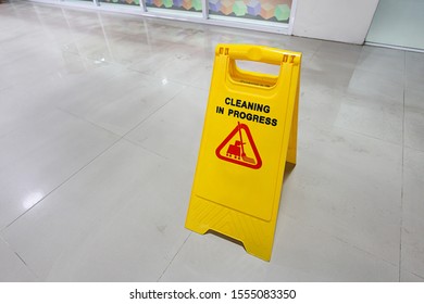 Cleaning In Progress Sign On The Floor.