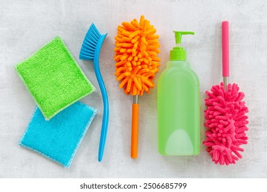 Cleaning service concept with chemical cleaning supplies bottles and tools. - Powered by Shutterstock