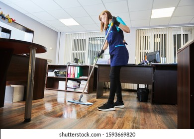 Cleaning Service. Wiping Office Floor With Mop