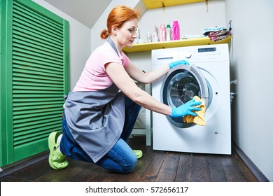 Cleaning Service. Woman Cleanse Washing Machine