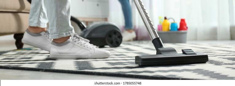 Cleaning Service Worker Vacuuming Carpet Indoors, Closeup. Banner Design