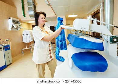 Cleaning Services. Woman With Ironing Machine Working At Hotel