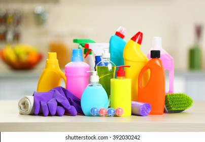 Cleaning Set With Products And Tools On Kitchen Table