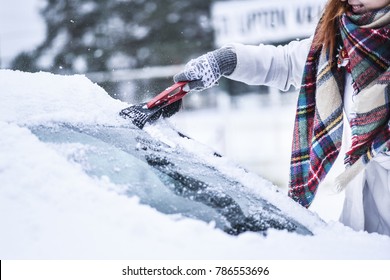 Cleaning Snow From Windshield, Scraping Ice,  Winter Car Window Cleaning