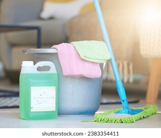 Cleaning, soap detergent product and bucket with mop for domestic work, household chores and sanitizing house to get rid of germs, bacteria and dirt. Clean living room, shiny floor and spotless house - Shutterstock ID 2383354411