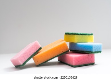 cleaning sponges on a white background - Powered by Shutterstock