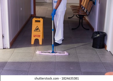 Cleaning Staff Performing Disinfection And Hygiene Work In Hospital Facilities