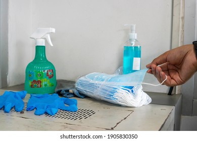 Cleaning Staff Pulled The Mask On The Table By Hand.