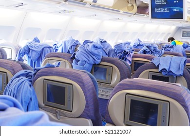 Cleaning Staffs Clean Inside The Cabin Of Commercial Airplane.