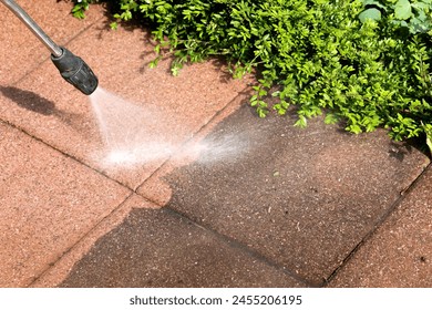 Cleaning stone patio slabs with high pressure