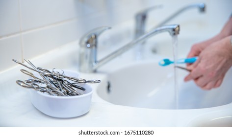 Cleaning Of Surgical Instruments In The Sink After Surgery