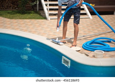 Cleaning A Swimming Pool In Summer, Service