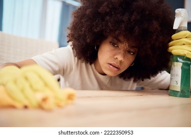 Cleaning, Table And Black Woman Wipe Dust From Surface Of Furniture, Desk And Counter At Home. Domestic Hygiene, Housework And Girl Using Cleaning Products, Detergent And Spray Bottle To Clean House