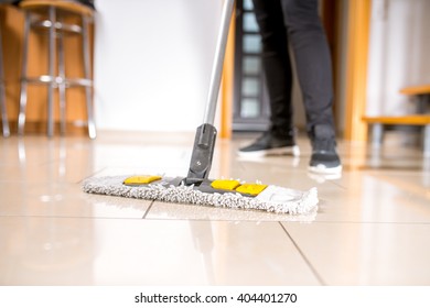 cleaning the tile floor