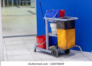 Cleaning Tools Cart Wait For Cleaning.Bucket And Set Of Cleaning Equipment In The Office And Department Store. Cleaning Service Concept