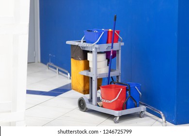 Cleaning Tools Cart Wait For Cleaning.Bucket And Set Of Cleaning Equipment In The Office And Department Store. Cleaning Service Concept