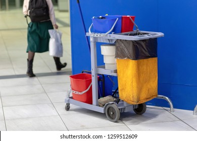 Cleaning Tools Cart Wait For Cleaning.Bucket And Set Of Cleaning Equipment In The Office And Department Store. Cleaning Service Concept