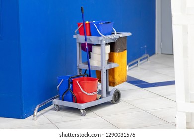 Cleaning Tools Cart Wait For Cleaning.Bucket And Set Of Cleaning Equipment In The Office And Department Store. Cleaning Service Concept