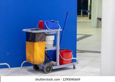 Cleaning Tools Cart Wait For Cleaning.Bucket And Set Of Cleaning Equipment In The Office And Department Store. Cleaning Service Concept