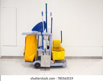 Cleaning tools cart wait for cleaning.Bucket and set of cleaning equipment in the office and Department store. cleaning service concept