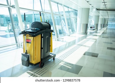 Cleaning tools cart wait for maid or cleaner in the airport. Bucket and set of cleaning equipment in the hospital. Concept of service, worker and equipment for cleaner and health