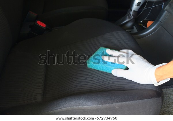 Cleaning and Waxing car\
interiors