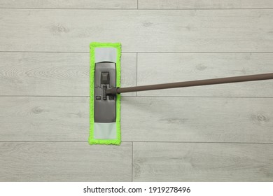 Cleaning Of Wooden Floor With Mop, Top View