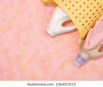 Cleanliness and maid concept. Copy space for text, top view. Laundry basket and detergent. - Shutterstock ID 2364313115