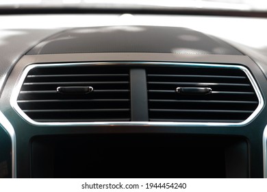 Cleanly Designed Twin Front AC Vent  On A Modern Car