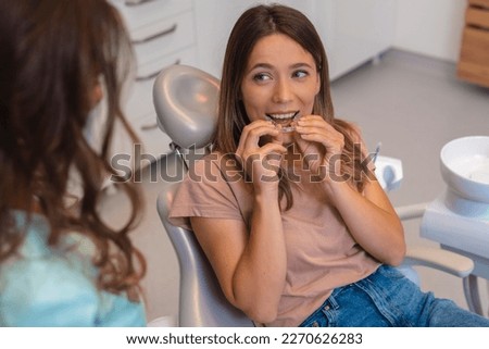 Clear aligner for bite correction and shape of teeth