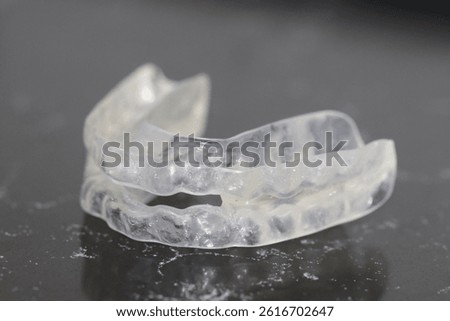 Clear aligner treatment designed for teeth clenching and grinding in dental dentistry. Jaw and dental night guard used for bruxism treatment.

