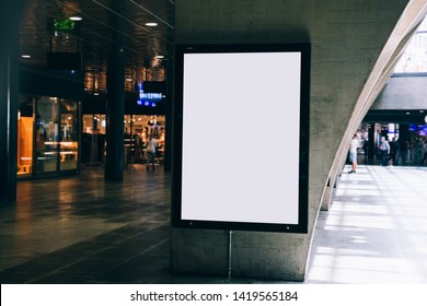 Clear Billboard in public place with blank copy space screen for advertising or promotional poster content, empty mock up Lightbox for information, blank display in station area with daylight - Shutterstock ID 1419565184