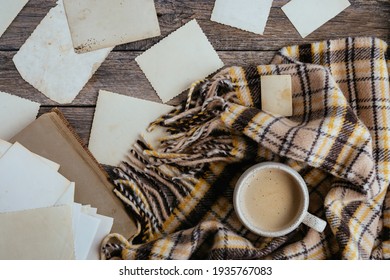 Clear Blank Photo Frames To Placed Your Pictures Or Text On Wooden Background With Mug Of Coffee And Brown Cozy Plaid. Warm Composition In Retro Style. Family Traditions, Memory And Nostalgia Concept