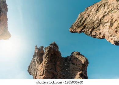 clear blue daytime sky over natural stone columns in Peru - Shutterstock ID 1285936960