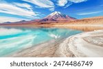 Clear Blue Lake in the Atacama Desert with Volcanic Mountains