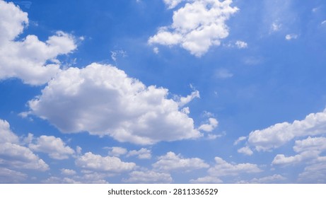clear blue sky background,clouds with background, Blue sky background with tiny clouds. White fluffy clouds in the blue sky. 
Captivating stock photo featuring the mesmerizing beauty of the sky and clouds.	