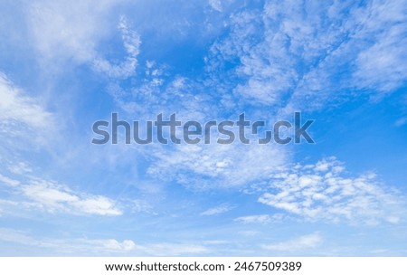 clear blue sky background,clouds with background, Blue sky background with tiny clouds. White fluffy clouds in the blue sky. 