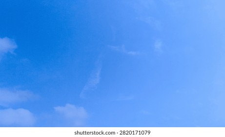 a clear blue sky, with less of clouds, beautiful for background needs 