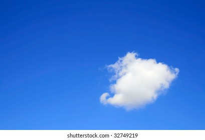 Clear Blue Sky With One Cloud