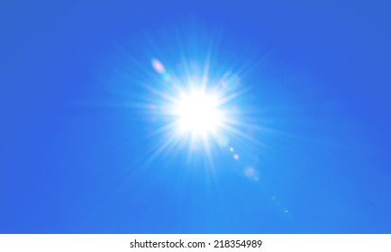 Clear Blue Sky Sun Light With Real Lens Flare Out Of Focus 