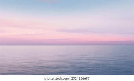 Clear blue sky sunset with glowing pink and purple horizon on calm ocean seascape background. Picturesque स्टॉक फ़ोटो