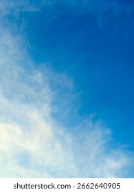 clear blue sky with thin clouds