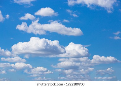Clear blue sky and white clouds.
Beautiful white cloud on clear blue sky as nature concept . Clear weather for good summer season. Fresh air breeze