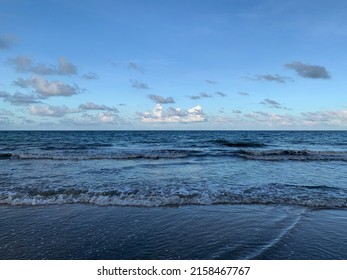 Clear Blue Water And Endless Horizon At The Beach.