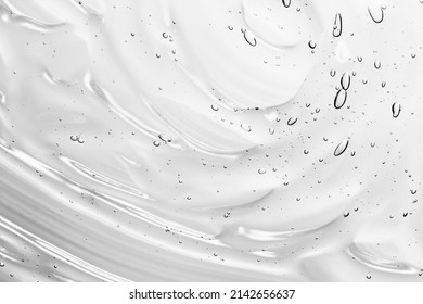 Clear gel serum texture. Liquid skincare cream background. Cosmetic gel product with bubbles close up - Shutterstock ID 2142656637