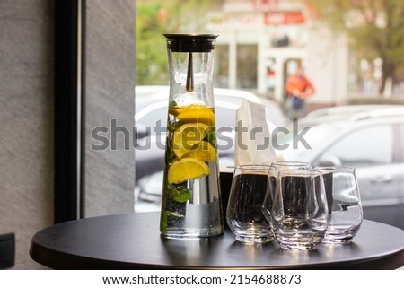Image, Stock Photo Water carafe with glasses on a table