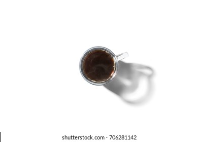 Clear Glass Mug With Coffee In Top Down View Isolated On A White Background