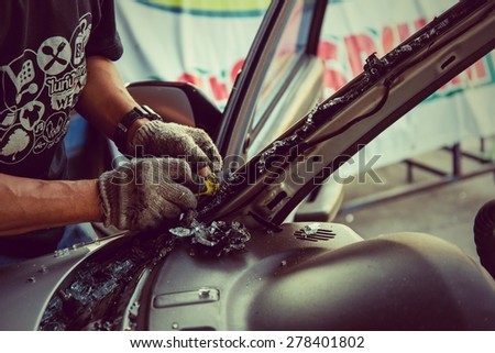 It is clear glass repair or auto accident on the road.